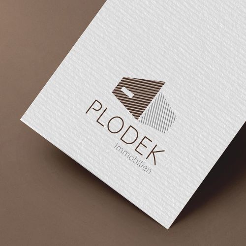 Plodek Immobilien Logo Design auf Papier
